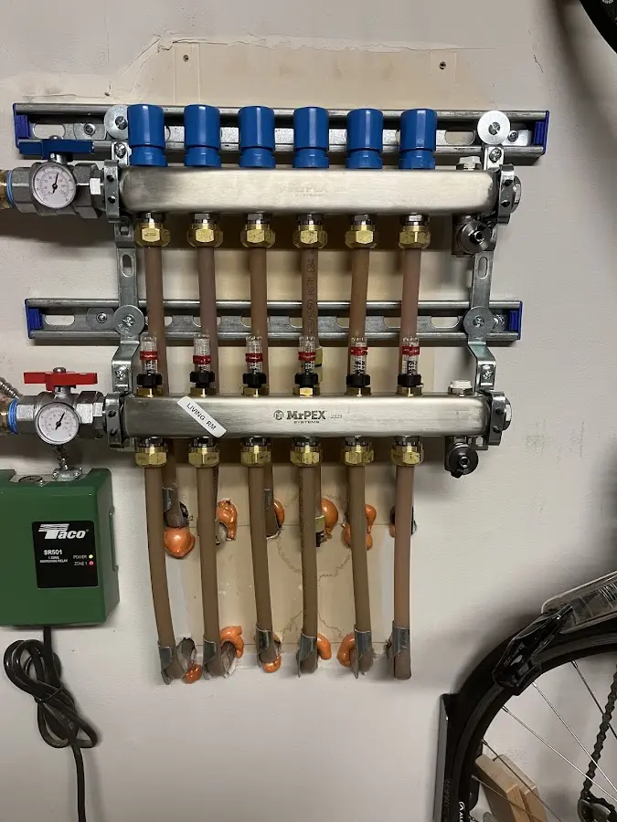 Plumber performing Leak Detection at a residential property in Blythewood